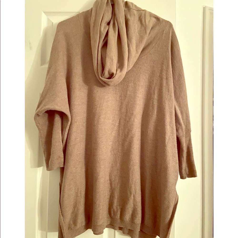 Loose neck over size sweater.